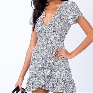 Princess Polly Rezar spotted black and‎ white ruffle mini dress size 4